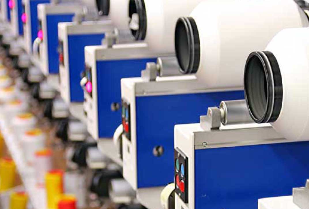 Industrial reels of thread in a textile factory